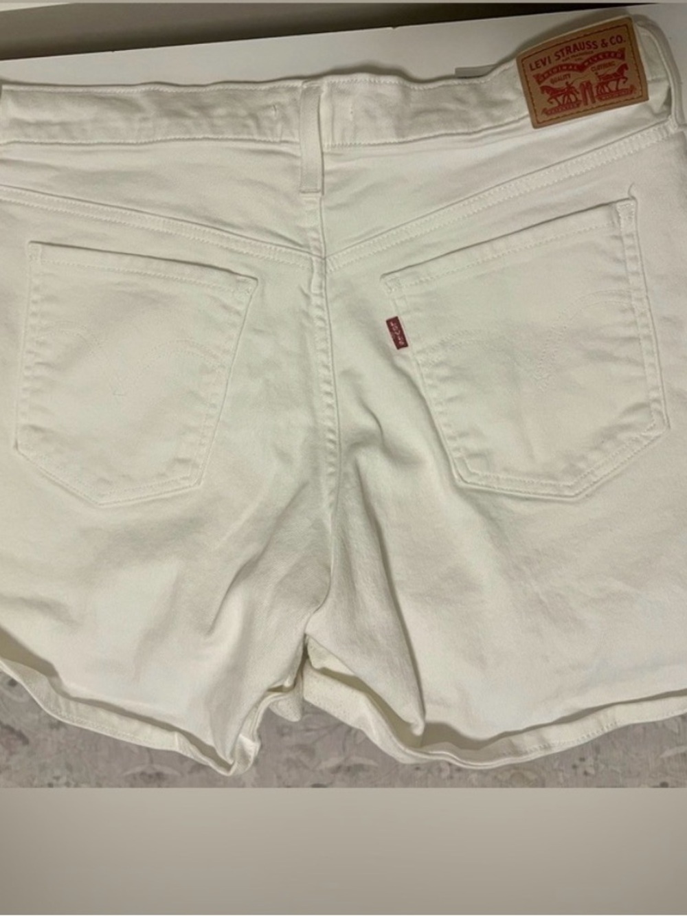 Levi's White Denim Cutoff Shorts with Back Pockets